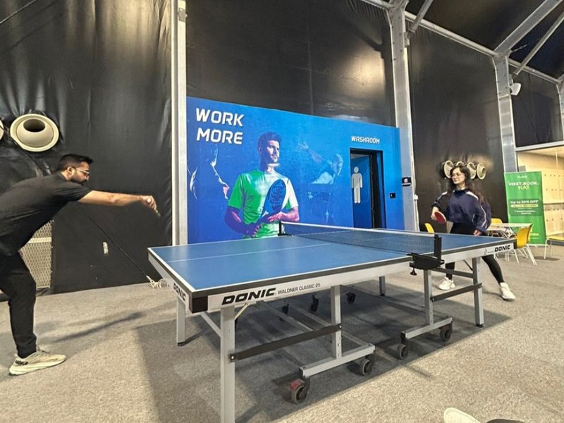 Across a table tennis net